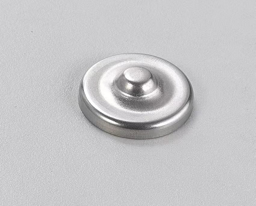 Deep-drawn stamped metal cap